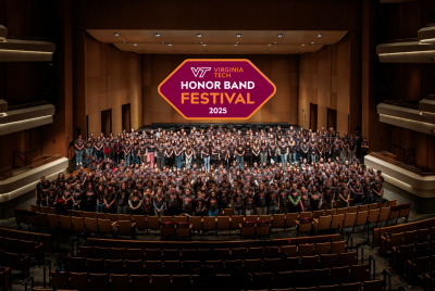 Students of the honor band festival stand on the stage of the Moss Arts Center