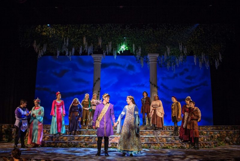 The cast of Ella Enchanted the Musical onstage for bows.