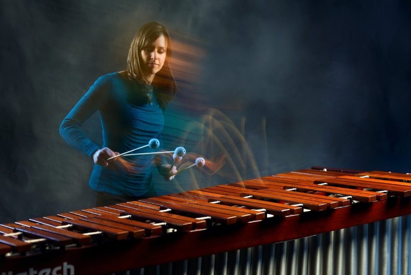 Annie Stevens plays marimba with two mallets in each hand